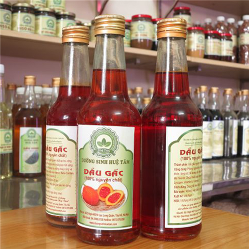 Bán Dầu gấc Huệ Tâm 300ml - Sản phẩm tự nhiên